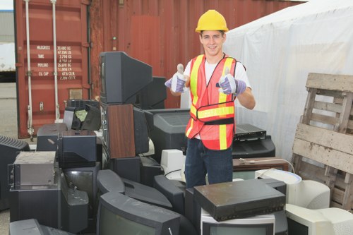 Demolition workers sorting construction debris